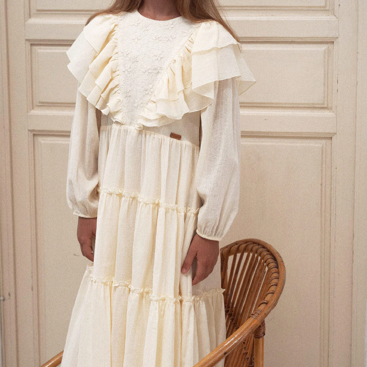 Popelin Mod 33.1 Off-white dress with triangular tulle yoke and frills